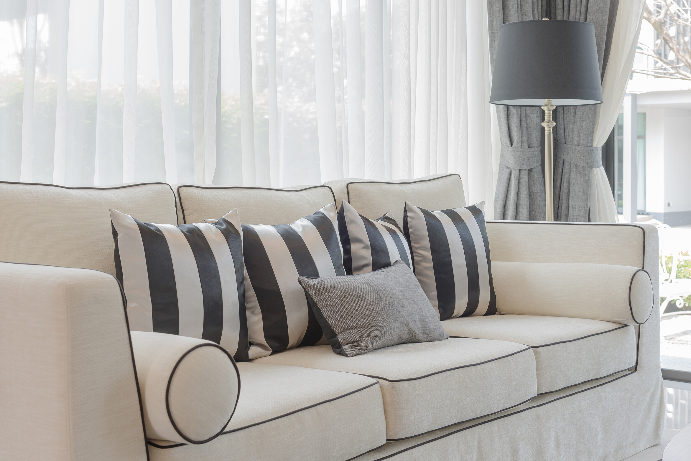 white elegance sofa with black and white pillows